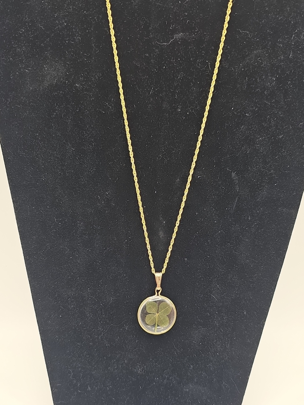 Gold Four-Leaf Clover Pendant Necklace - With Gold Tone Chain.